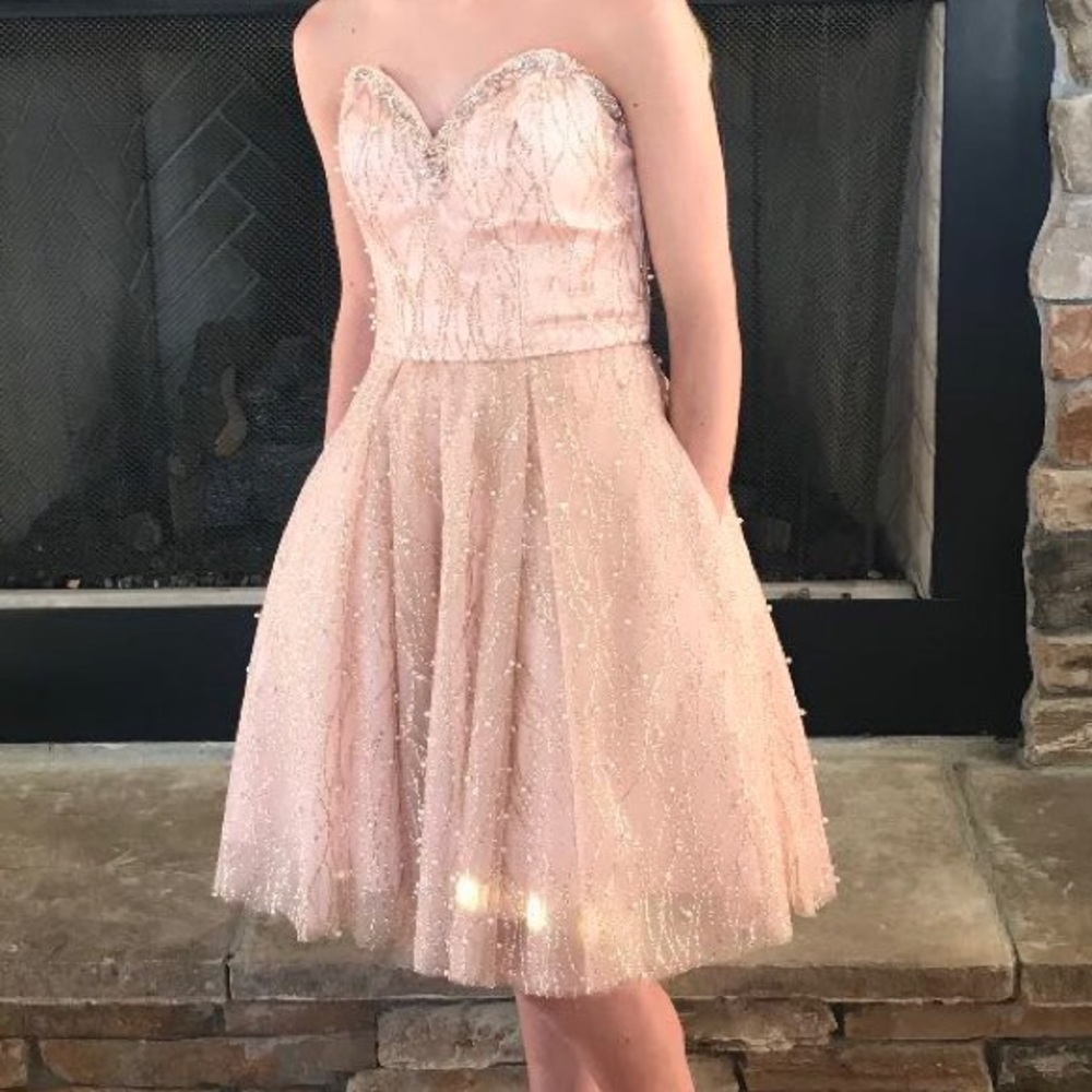 A stunning Mori Lee dress.